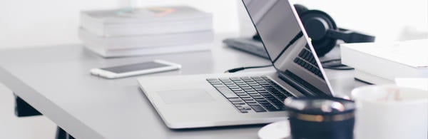 workspace with laptop and cellphone (c) Christopher Gower unsplash